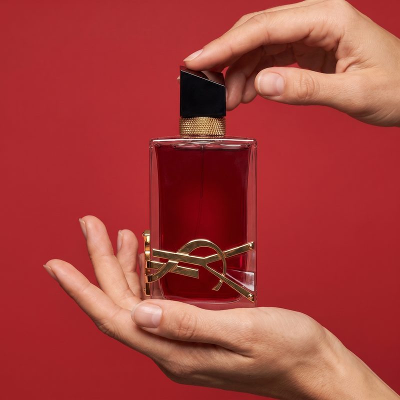 YSL Libre hands cradling bottle, hardware detail